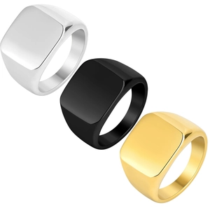 Detailed view of square signet rings in silver, matte black, and gold polished finishes