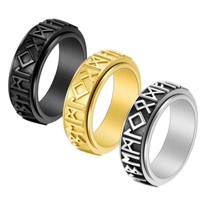 Set of three rotating Viking rune rings in black, gold and silver stainless steel