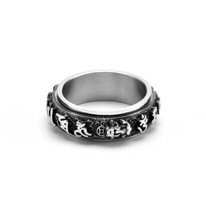 Detail of vintage rotatable stainless steel ring with Six-Word Mantra relief