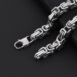 Men's polished stainless steel Byzantine chain bracelet with a sturdy lobster clasp