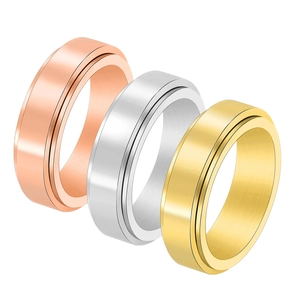Polished stainless steel spinner rings in gold, silver, and rose gold for couples