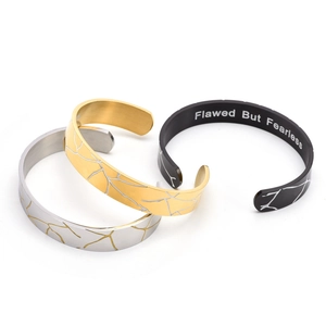 C-shaped wood grain textured couple bracelets in gold, silver, and black finishes