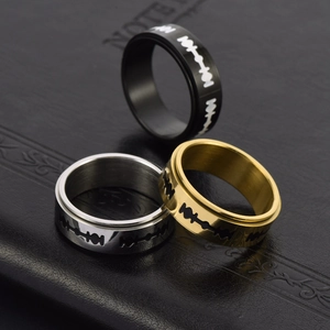 Three-piece stainless steel rotatable razor blade ring set in black, silver, and gold