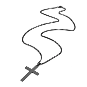 Detailed view of a minimalist black stainless steel cross pendant with a fine link chain