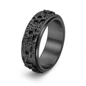 Vintage black stainless steel spinner ring with hammered texture and hexagram star relief