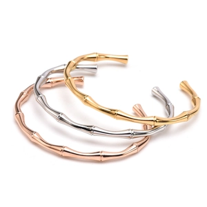 Eleganti bracciali a forma di bambù in finiture oro, argento e oro rosa