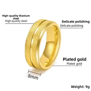 Detail view of 8mm gold titanium steel ring featuring frosted surface and polished edges