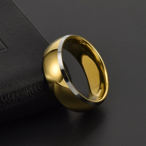 Polished gold and silver two-tone tungsten ring with elegant beveled edges for men