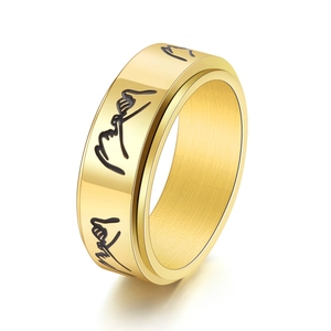 Minimalist gold stainless steel rotating ring with black hand-holding gesture pattern