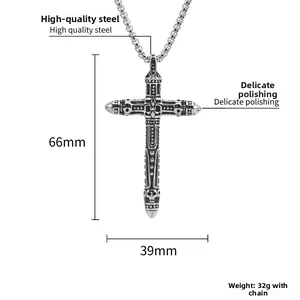 Macro detail of gothic cross pendant with mechanical textures and skull element, 66mm length