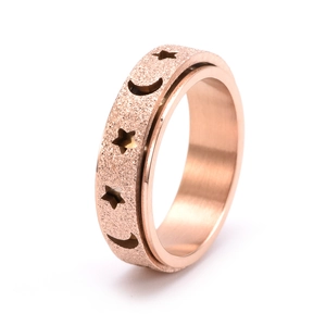 Roségoldfarbener Edelstahl-Spinner-Ring mit mattem Finish und Stern-Mond-Hohlmustern