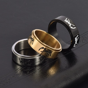 Spinner rings in silver, gold, and black with engraved pinky swear hand gesture design