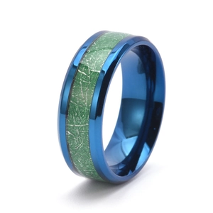 Detail view of 8MM titanium steel ring with blue finish and green inlay texture