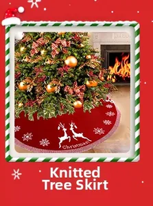 Detail of red knitted Christmas tree skirt featuring reindeer motifs and white wavy lace trim