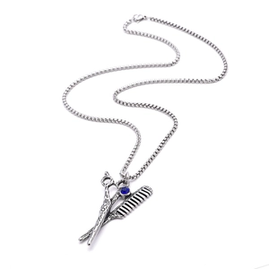 Collier de coiffeur vintage en acier inoxydable avec ciseaux, peigne et cristal bleu