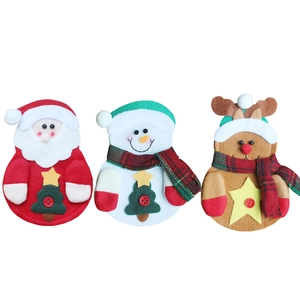Three-piece Christmas cutlery holder set featuring Santa, snowman, and reindeer designs