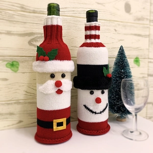 Knitted Santa and Snowman wine bottle covers for Christmas dinner table decoration