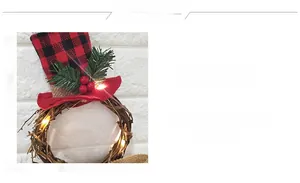 Detailed view of LED snowman Christmas wreath with pine needles and red berries
