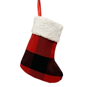 Classic red and black buffalo plaid Christmas stocking with white plush cuff for home decor