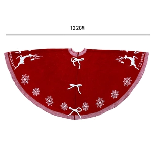 Red 122cm knitted Christmas tree skirt with white reindeer pattern and festive text