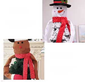 Detail of plush snowman and reindeer Christmas tree topper with flexible hugging arms