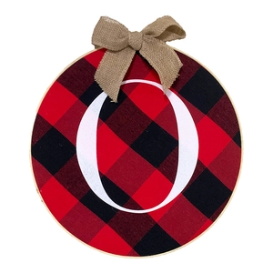 Detail of Buffalo plaid JOY door hanger featuring white letter O and burlap bow decoration
