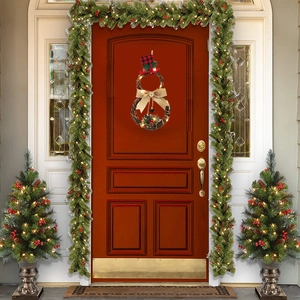LED lighted snowman Christmas wreath with rattan base and buffalo plaid hat on red door