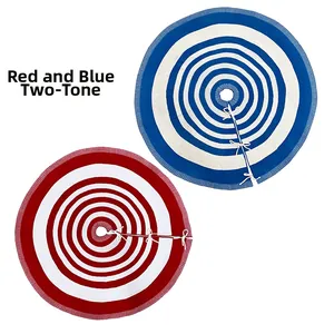 Detail of red and blue knitted Christmas tree skirts with festive striped pattern