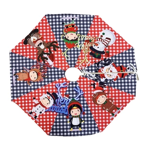 Knitted Christmas tree skirt with plaid patterns, Santa, reindeer, and snowman prints