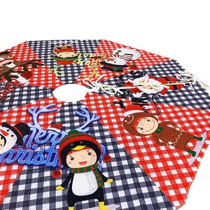 Classic red and black plaid Christmas tree skirt with festive characters and Merry Christmas text