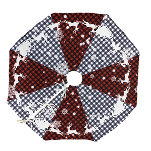 Red and black buffalo plaid Christmas tree skirt with white reindeer and snowflake prints