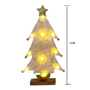 Close-up of a 32cm white felt Christmas tree with LED lights and gold star topper