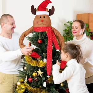 Charming plush reindeer Christmas tree topper with adjustable long arms and festive scarf