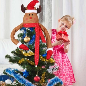 Plush reindeer Christmas tree topper with long arms and a red festive scarf