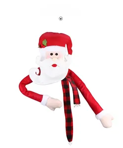 Detailed view of Santa tree topper with bendable arms and buffalo plaid scarf decoration