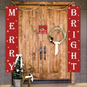 Close-up of red Merry and Bright hanging banners on a wooden door for Christmas