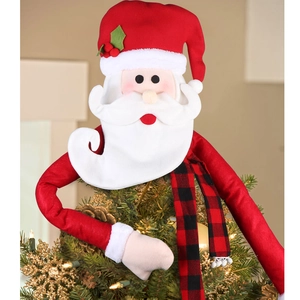 Detailed view of Santa Claus tree topper with long arms hugging a decorated Christmas tree