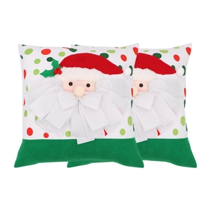 Close-up of 3D Santa Claus throw pillow with felt beard and red berry details