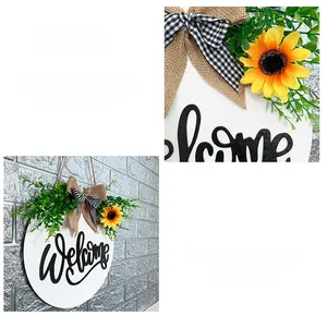 Detail of wooden welcome sign with yellow sunflowers and a black and white buffalo plaid bow