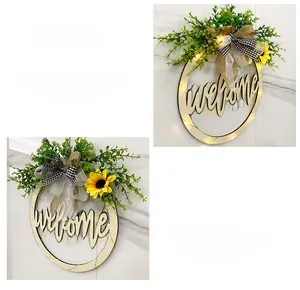 Detail of wooden welcome wreath featuring warm LED lights and yellow sunflower accents