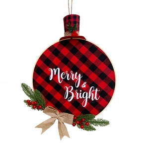 Detail of buffalo plaid Christmas wreath with pine needles, berries and Merry & Bright text