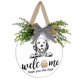 Wooden welcome door sign featuring dog line art and colorful Easter egg decoration