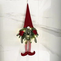 Vertical wall decor of a Christmas gnome with a long red knit hat and LED lighted beard