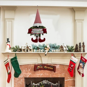 Christmas gnome wreath decoration with red white stripes and merry Christmas banner sign