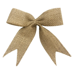 Natural jute burlap bow for Christmas tree decoration with rustic handmade texture