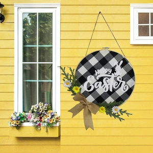 Detailed view of Happy Easter bamboo hoop wreath with buffalo plaid and faux daisies