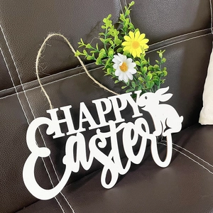 Detail of Happy Easter wooden door wreath with white rabbit cutout and yellow daisies
