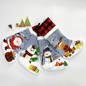 Set of 4 Christmas stockings with Santa, Reindeer, Snowman and Polar Bear prints