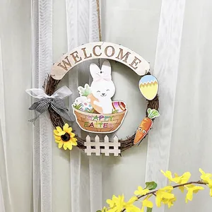 Close-up of Easter wreath with wood welcome sign, white bunny and colorful eggs basket