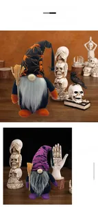 Detail of Halloween gnome plush with spider web hat and bat patterns on purple and orange fabric